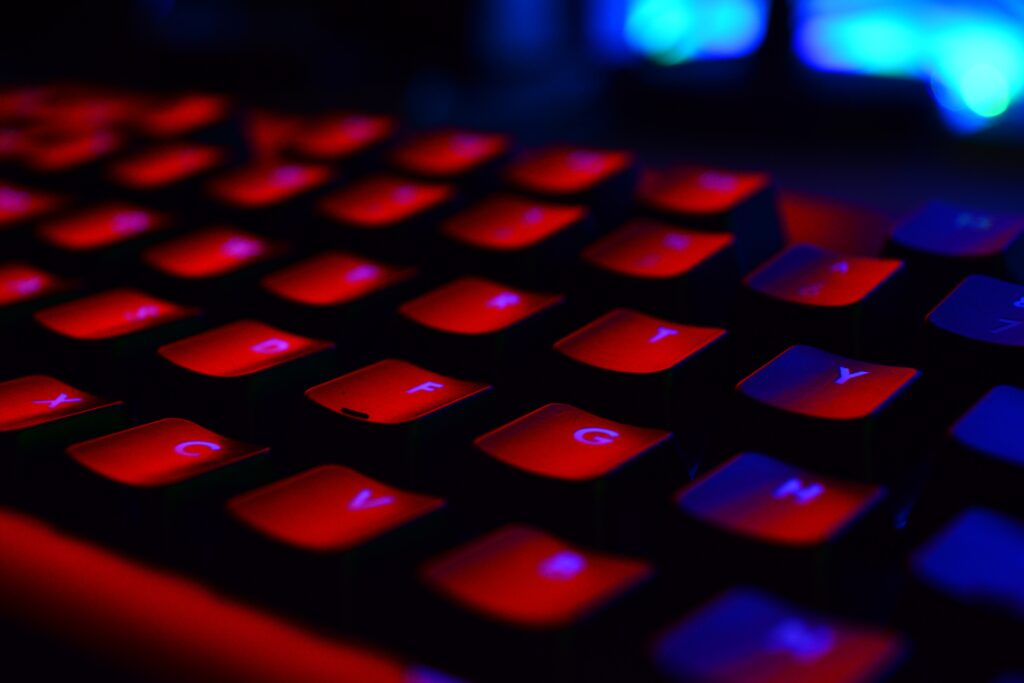 A keyboard with red and blue light