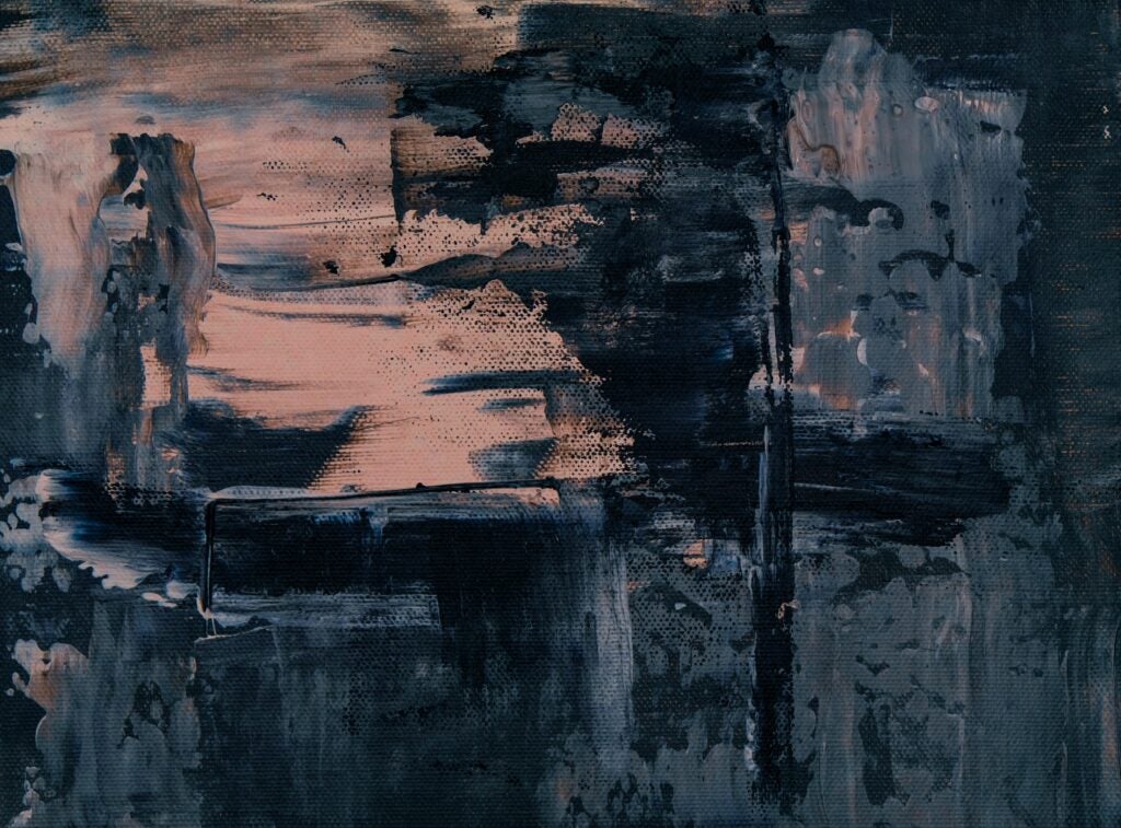 Dark paint applied in painterly style.